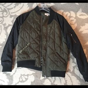 Green and black bomber jacket
